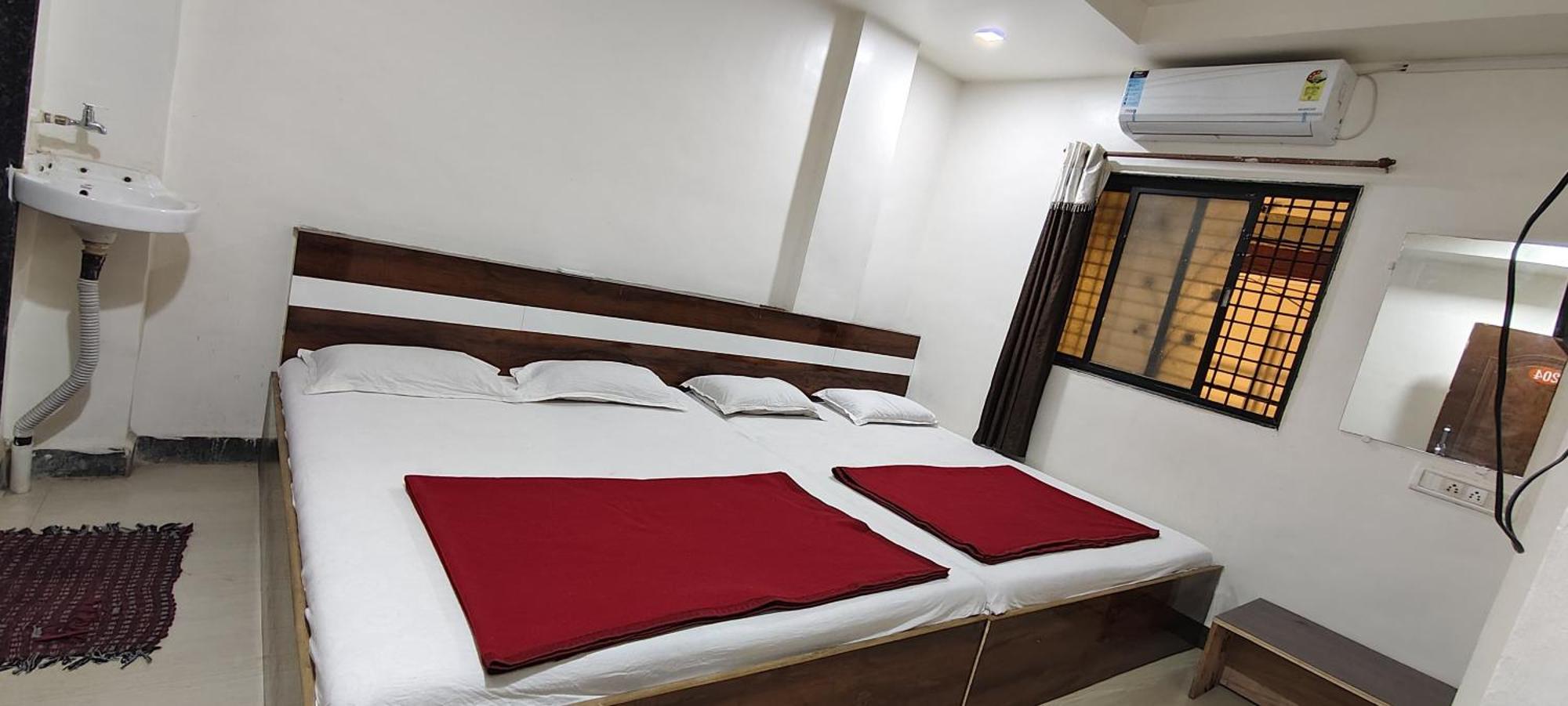 Sai Ganesh Guest House Shirdi Phòng bức ảnh